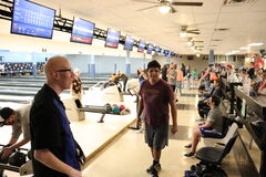 Athletes at the bowling alley.