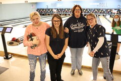 Athletes at the bowling alley.