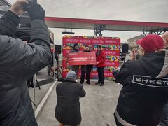 Sheetz opening donation check.